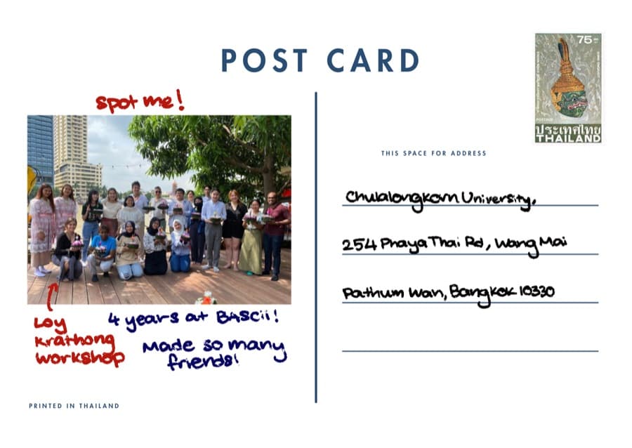 Postcard back from Thailand, addressed and stamped, with a photo and handwritten notes